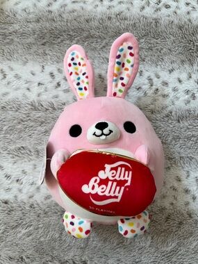 Snackles | Flossie the Bunny Plush Holding Jelly Bean Pillow
